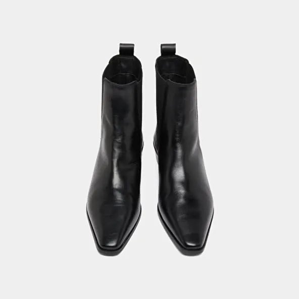 Boots with slight beveled heels and pointed toes in black leather