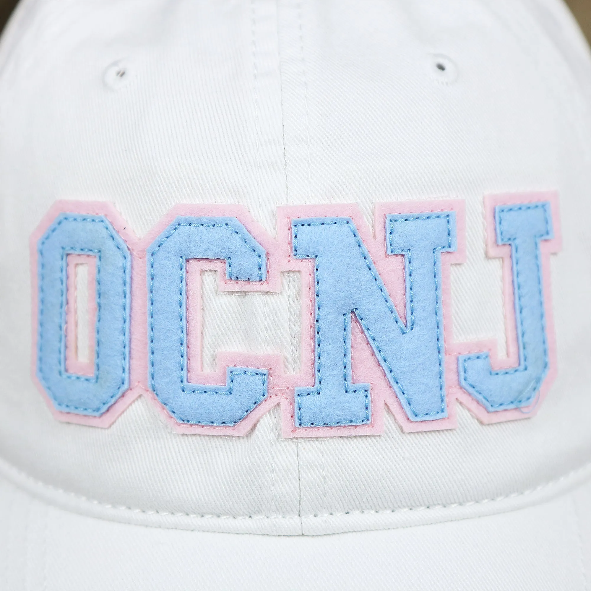 Light Blue OCNJ Wordmark Pink Outline Dad Hat | White Dad Hat