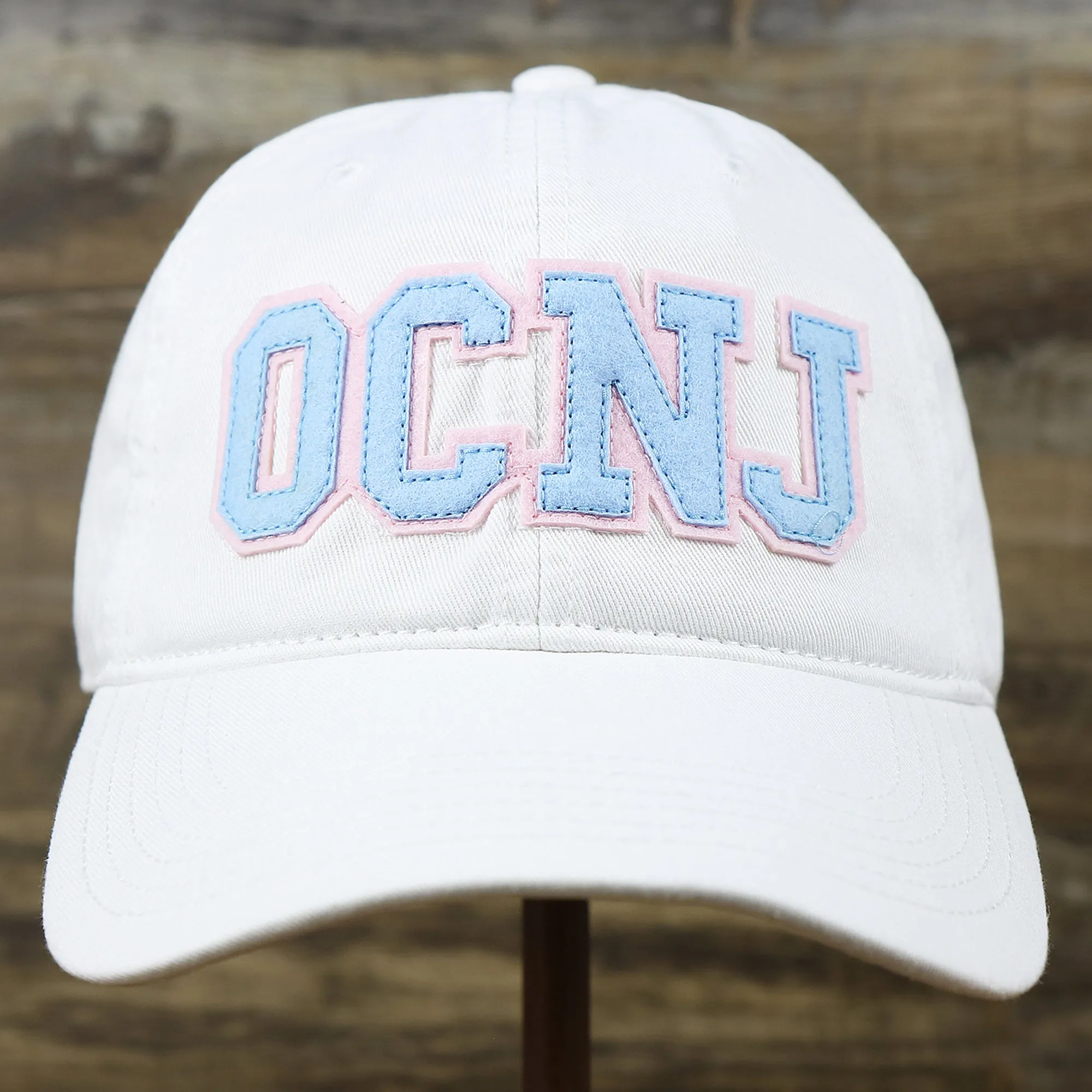 Light Blue OCNJ Wordmark Pink Outline Dad Hat | White Dad Hat