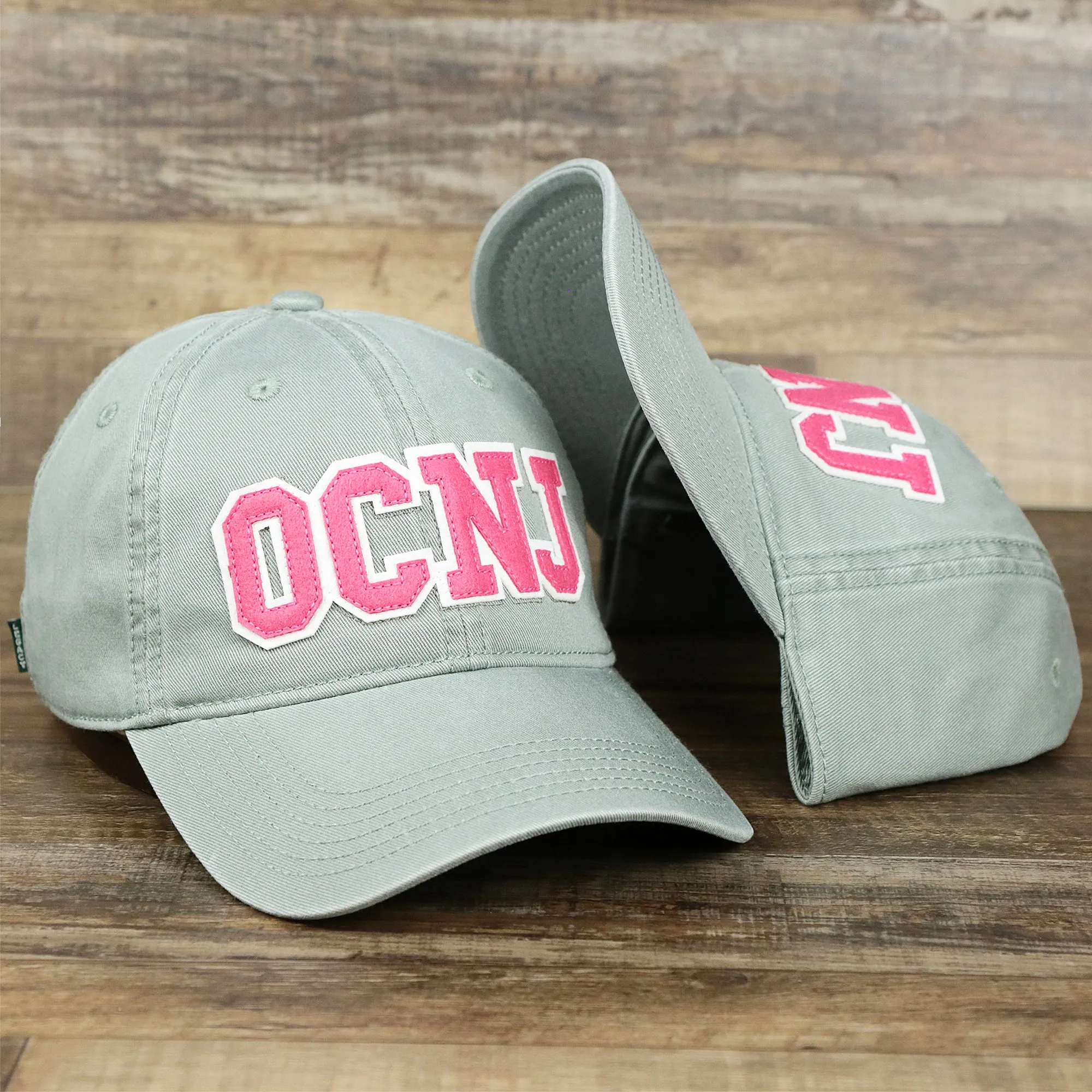 Pink OCNJ Wordmark White Outline Dad Hat | Sawgrass Dad Hat