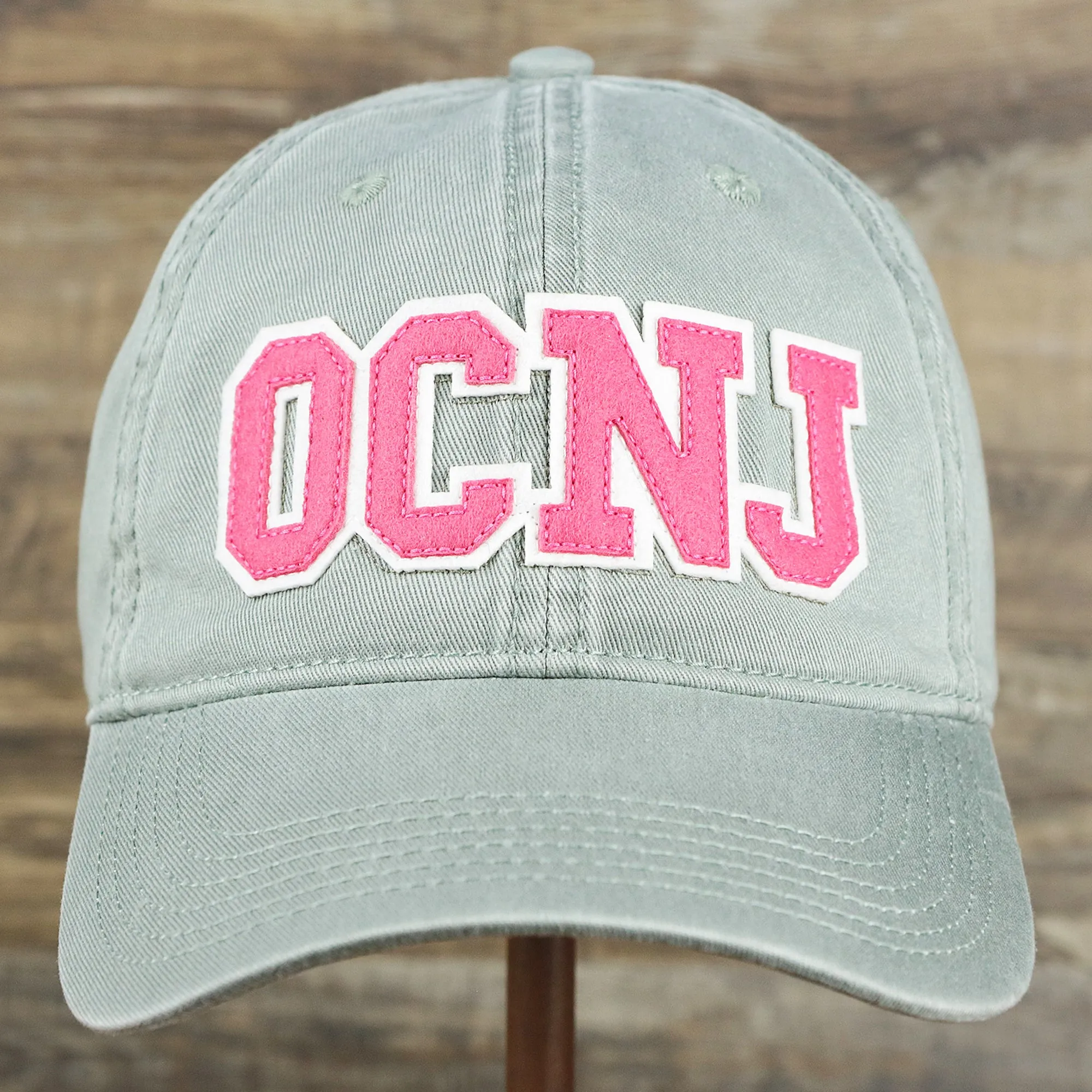 Pink OCNJ Wordmark White Outline Dad Hat | Sawgrass Dad Hat