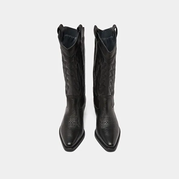 Pointed toe boots with exposed stitching in black grained leather